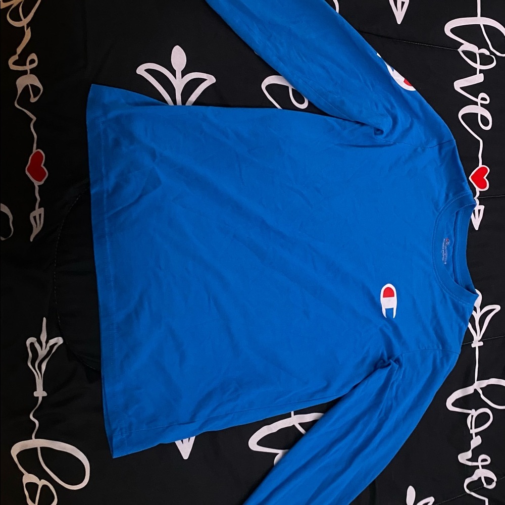 Champions T-shirt, worn a few times. In good conditon.
